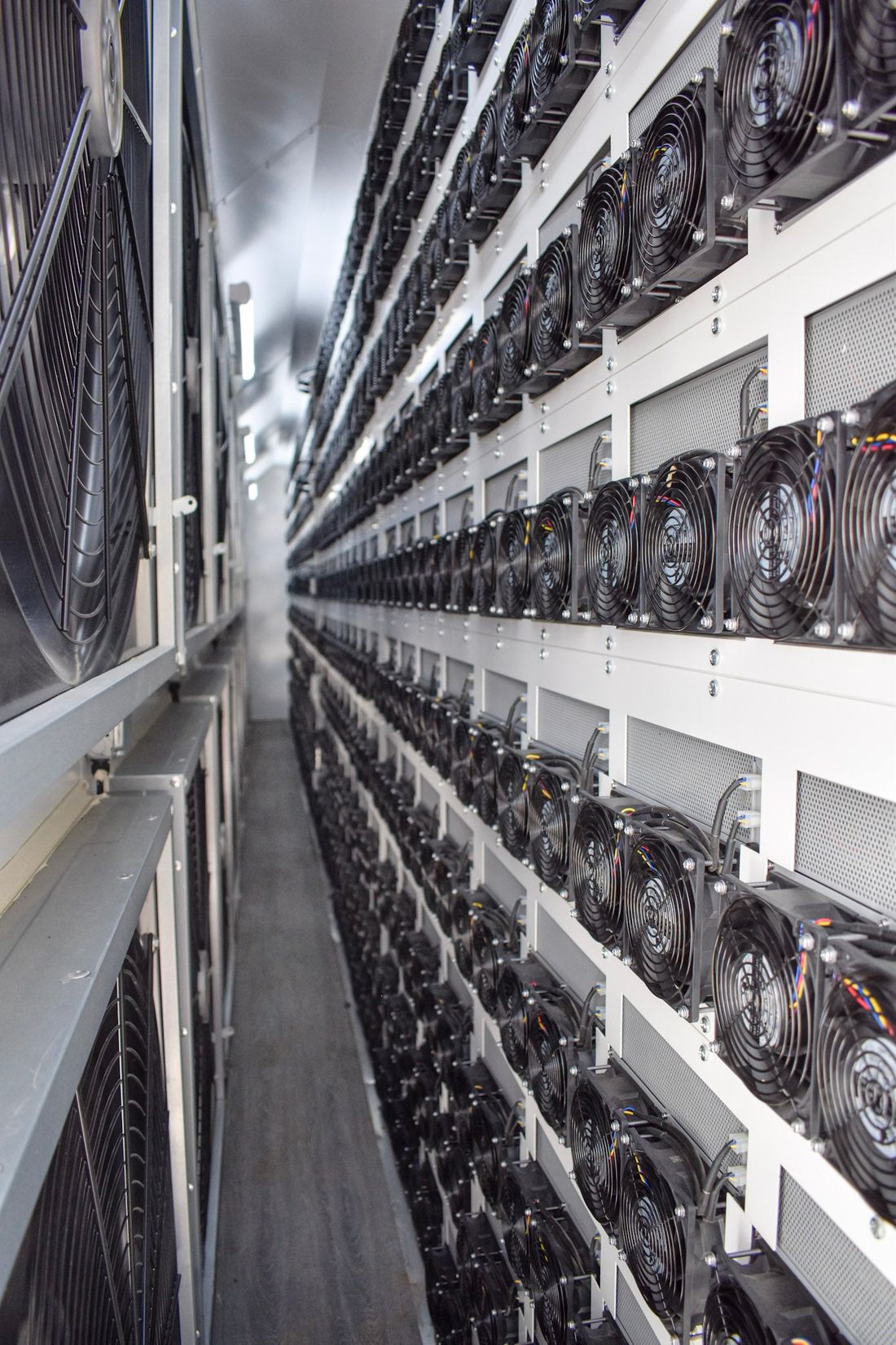 Miners inside a container
